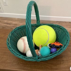 Basket of balls and toys